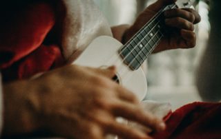 Person playing a ukelele